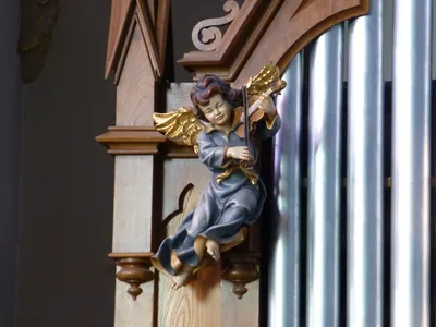 Angel statue on organ.