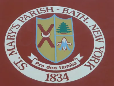 Logo on the covering above the front entrance.