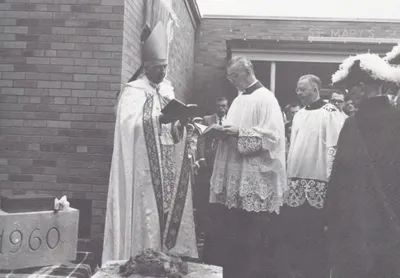 Laying cornerstone for the school, 1960. Source: Parish Web site