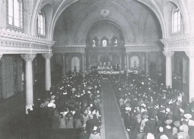 Interior of present church, ~1920. Note the absence of the sanctuary dome paintings and the baldacchino. Source: Images of America: Around Canandaigua