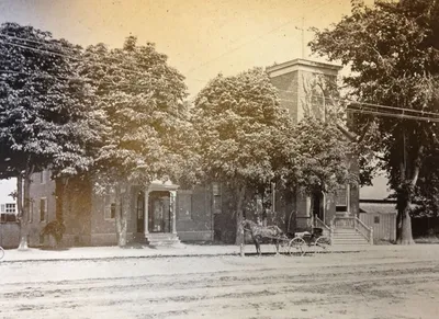 Exterior of former church. Source: Parish history book (1919)