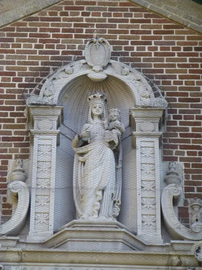 Statue of Our Lady above entrance.
