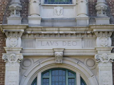 Carvings above entrance.