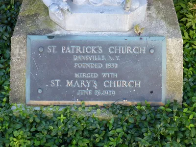 Memorial plaque remembering former St. Patrck's church in Dansville.