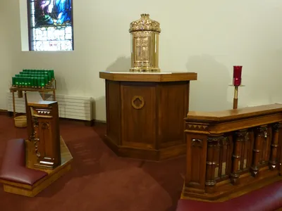 Tabernacle and portions of the former altar rail.