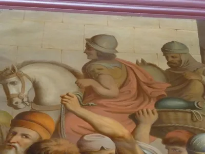 The artist hid his face in three of the stations. Here it's on the shoulder.