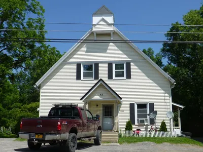 Former church building down the road from the present church. Now a private residence.