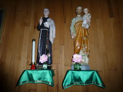 Statues of St. Maxamilian Kolbe and St. Joseph.
