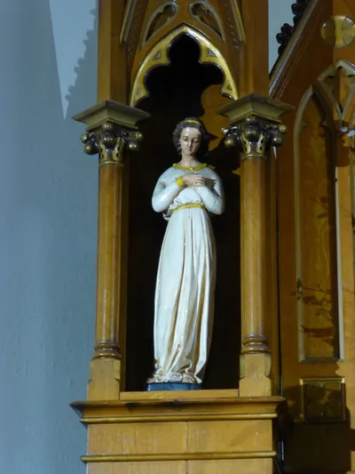 Statue in reredo.