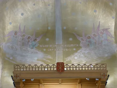 Close-up of paintings on sanctuary ceiling.