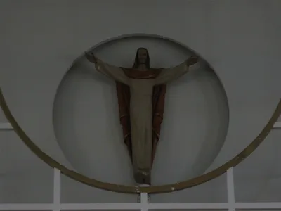 Wall-mounted statue of Christ.