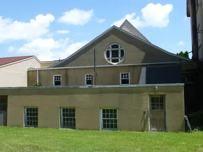 Behind the chapel.