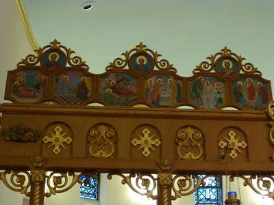Icons atop iconostasis.