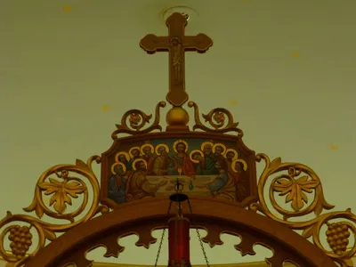 Icons atop iconostasis.