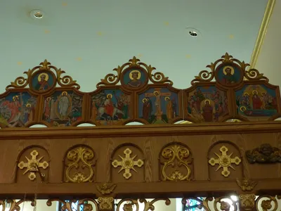 Icons atop iconostasis.