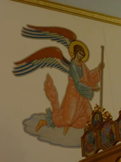 Angel icon on wall.