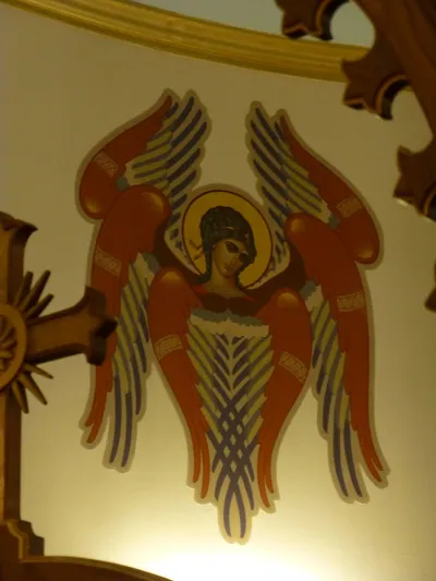Angel icon on wall.
