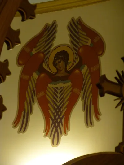 Angel icon on wall.