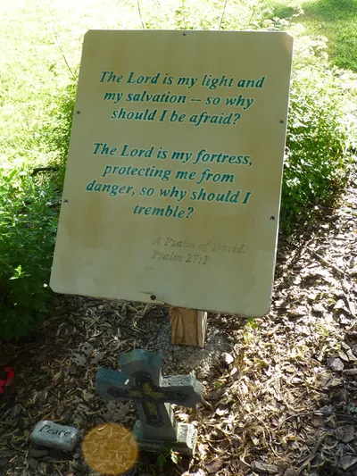 Biblical verse sign.