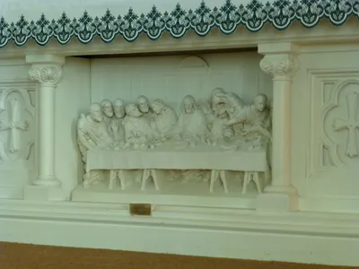Relief on altar.