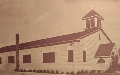 Another photograph of church destroyed by 1967 fire. Note slight difference to entryway arches from previous image. Source: St. Philip Neri Fire: Rescuing the Blessed Sacrament