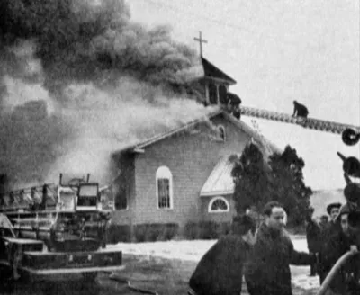 Fire engulfing the former church, 1967. Source: Sacred Heart Cathedral history video