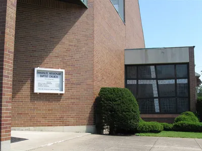 Stained glass window seen from outside.