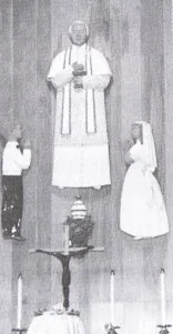 Statue of St. Pius X above the altar in the former church, 1961. Source: A Work In Progress: St. Pius the Tenth Parish, the First 150 Years