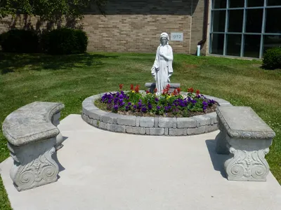 Our Lady garden and benches.