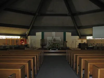 Interior, July 2011. Statues moved to center of the cross behind altar.