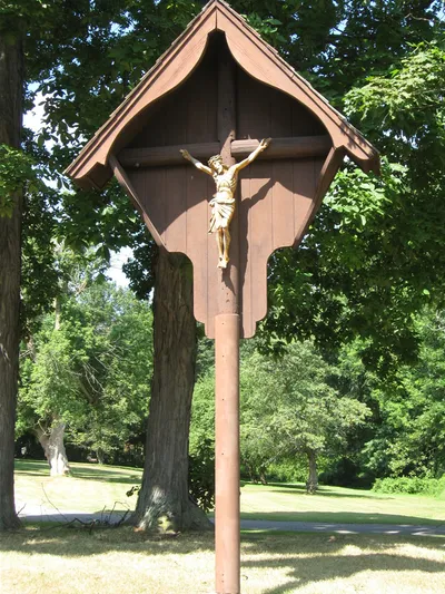 Outdoor crucifix, along the west entrance.