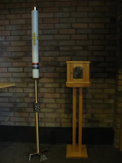 Paschal candle and ambry.
