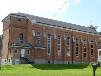 Left side seen from parking lot.