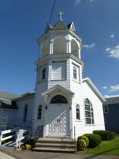 Main entrance and bell tower.