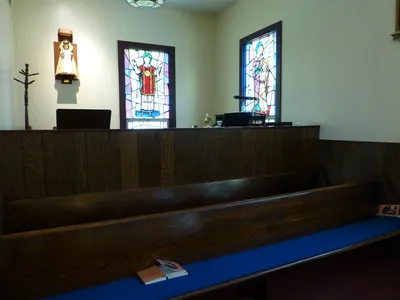 Choir seating in the back left corner.