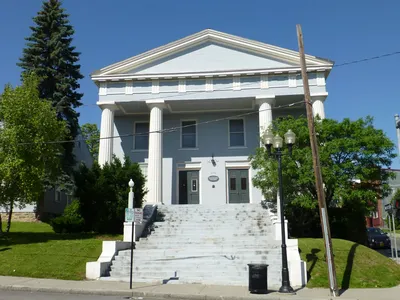 Exterior of first church building used from 1904-1912. Was formerly a Dutch Reformed Church, then later a Masonic Temple. Now it's an apartment complex. 380 S. Main St.