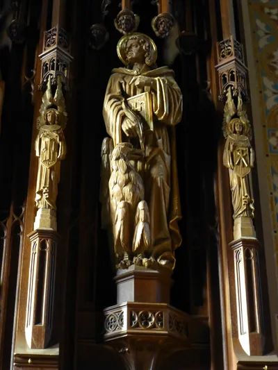 Statue in reredo.