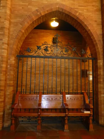 Server seating and one of the iron gates in the sanctuary.