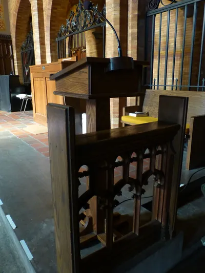 Cantor stand and portion of altar rail.