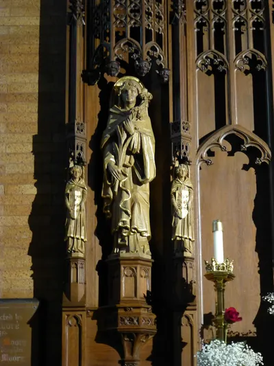 Statue in reredo.