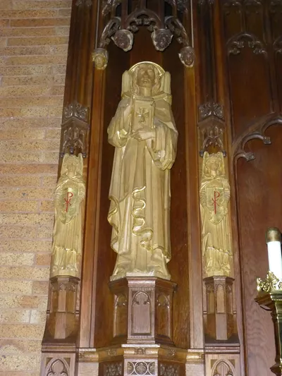 Statue in reredo.