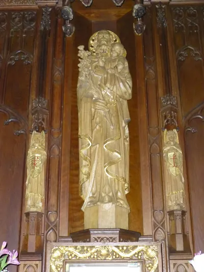 Statue in reredo.