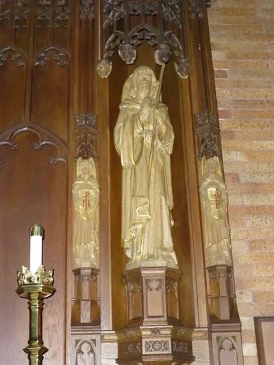 Statue in reredo.