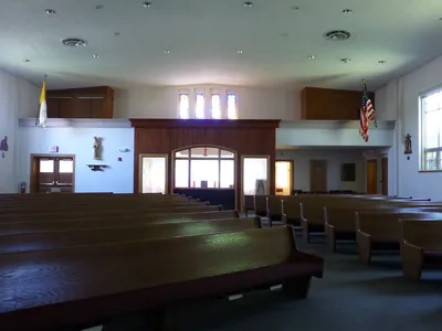 Left side of the church, former back of the church w/ old choir loft. Adoration chapel is below that.