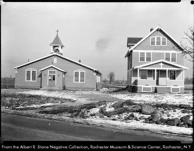 Former church and rectory, 1920. Rectory stood well into the 1990s, while the church was razed in 1973. Source: Albert R. Stone negative collection