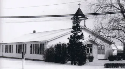 Photograph of former church, possibly early 1970s. Church has been painted white. Source: Images of America, Gates