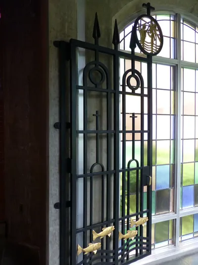 Gate and designs leading to baptistry.