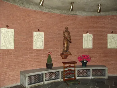 Stations of the cross and St. Joseph the Worker statue.