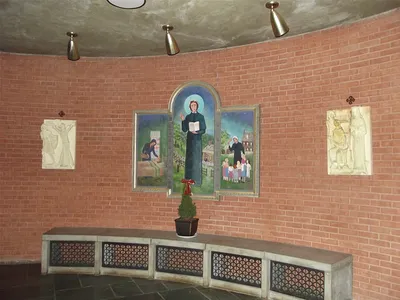 Stations of the cross and painting of St. Elizabeth Ann Seton.