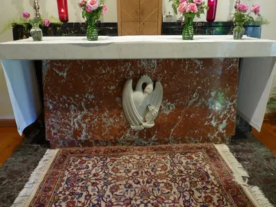 High altar with heron relief.